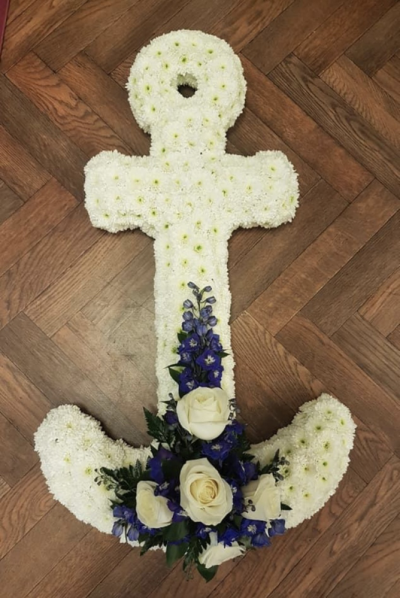 Anchor - A Seafarers Anchor.  Based in White Chrysanthemums and finished with a floral spray the colour of your choice.