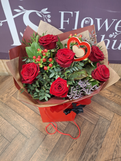 Cherish - A bouquet of 6 Red Roses expertly handtied by one of our florists and hand delivered .