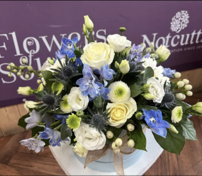 Baby boy Blue - A hat box of flowers ,created by our florist to celebrate the arrival of a new boy boy .Hand delivered to the new parents.
